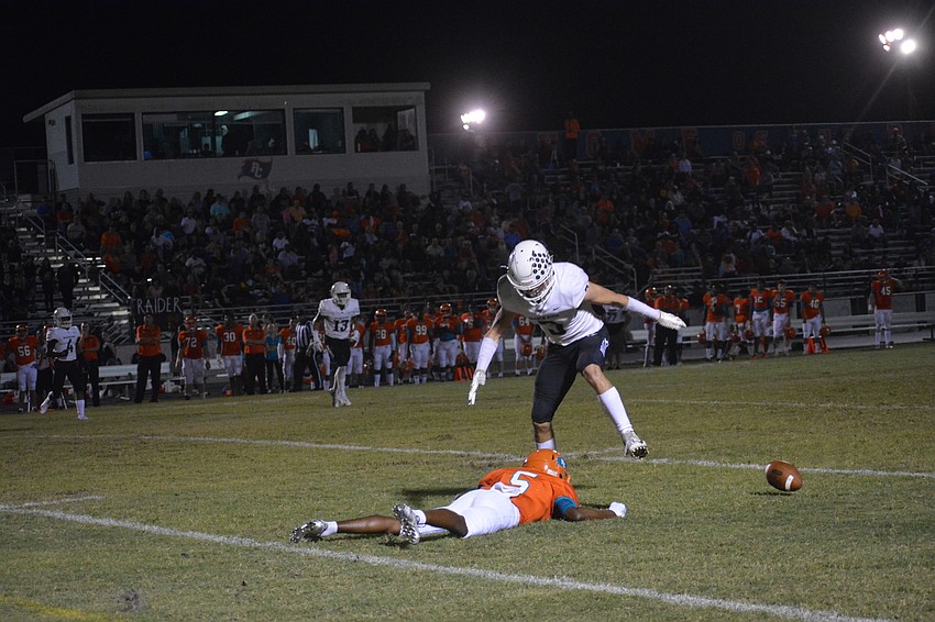 Senior linebacker Noah Font steps over a Plant City wideout after breaking up a pass.