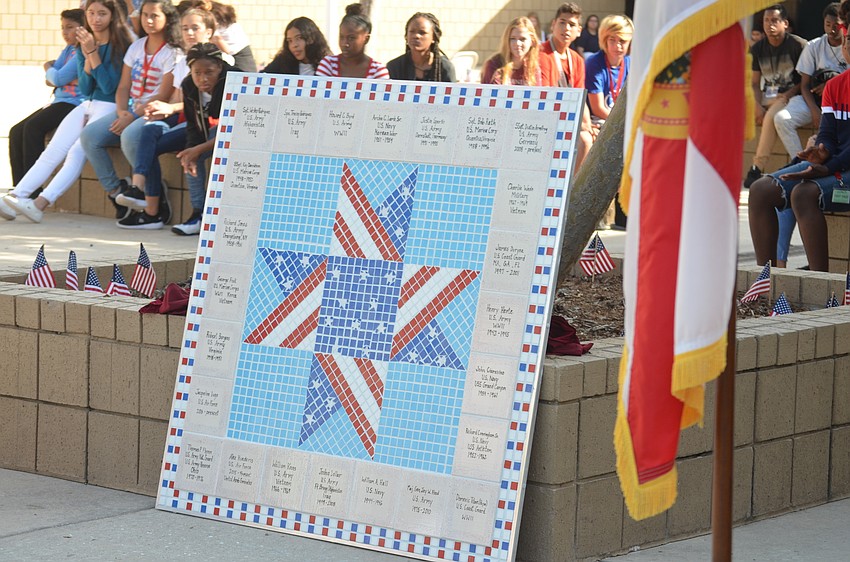 The mosaic, made by art students, displays the names of veterans who hold a special place in the hearts of people at Braden River Middle.