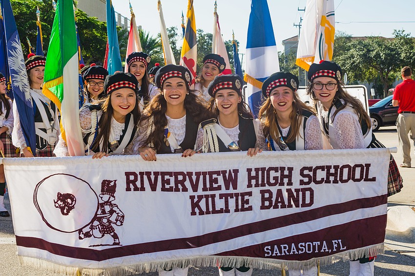 Members of the Riverview High School Kiltie marching band prepare for the parade.