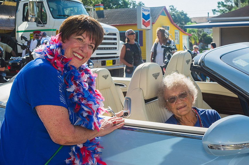 Phyllis DeBlasi with Amy Schlaf. Schlaf helped built aircraft and bombs during World War II.