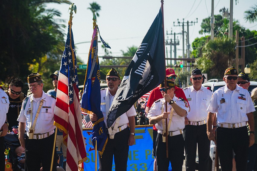 Parade participants get ready to walk down Main Street.