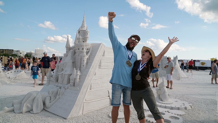 Sculptors Andrius Petkus of Lithuania and Melineige Beauregard of Canada won first prize in the team artist category for “Alice Down the Time Hole.” Courtesy photo.