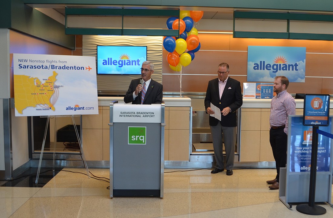 Rick Piccolo, SRQ president and CEO, Robert Spencer, Sarasota Manatee Airport Authority board chairman and Drew Wells, Allegiant&#39;s vice president of planning and revenue appear at a press conference Tuesday regarding new service.