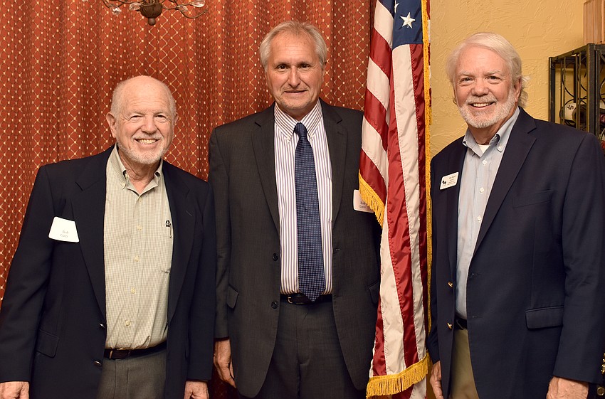 Bob Gary, guest speaker Rob Lorei and Longboat Key Democratic Club President Ken Marsh