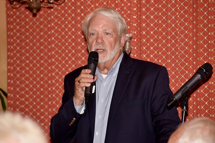 Longboat Key Democratic Club President Ken Marsh welcomes the attendees.