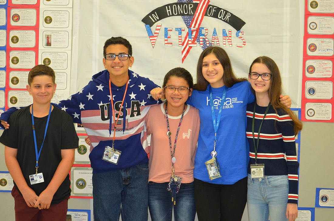 Ryan Hanson, Nicholas Harlin, Hannah Barrineau, Samantha Greenfield, Autumn Nix say the reason they put so much effort into the drive is because they all know someone who has served or is serving in the military.