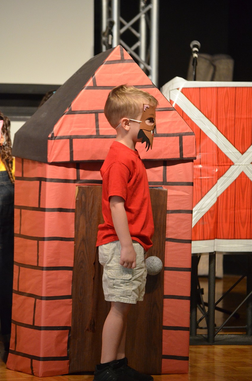Drake Truxillo had to take a break during his performance as the big bad wolf to sneeze, in between huffing and puffing the stick house and the brick house.