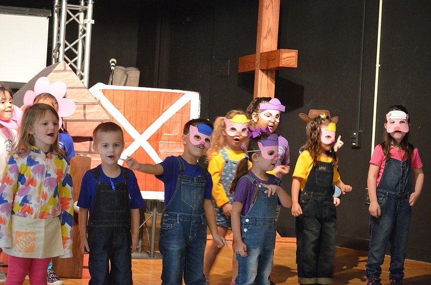 The Pre-K class sang their opening and closing song for the crowd and received a standing ovation.