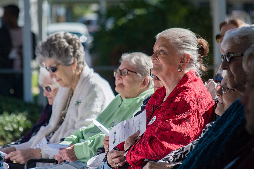 Residents of the Pines of Sarasota listen to speakers during the proclamation ceremony.