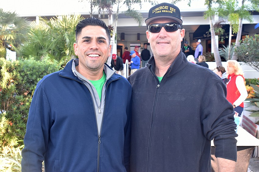 Jose Rivera and Fire Rescue Chief Paul Dezzi