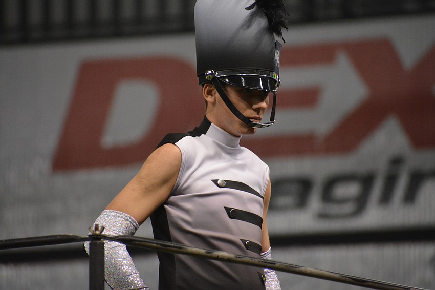 Marshall Knapp, a senior, is one of the drum majors that lead the Braden River marching band to victory.