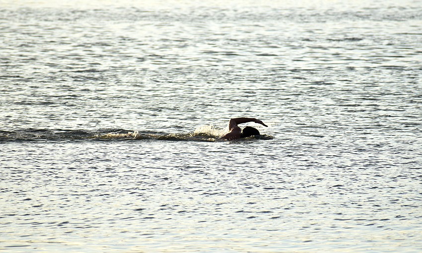 Triathletes began the course with swimming.
