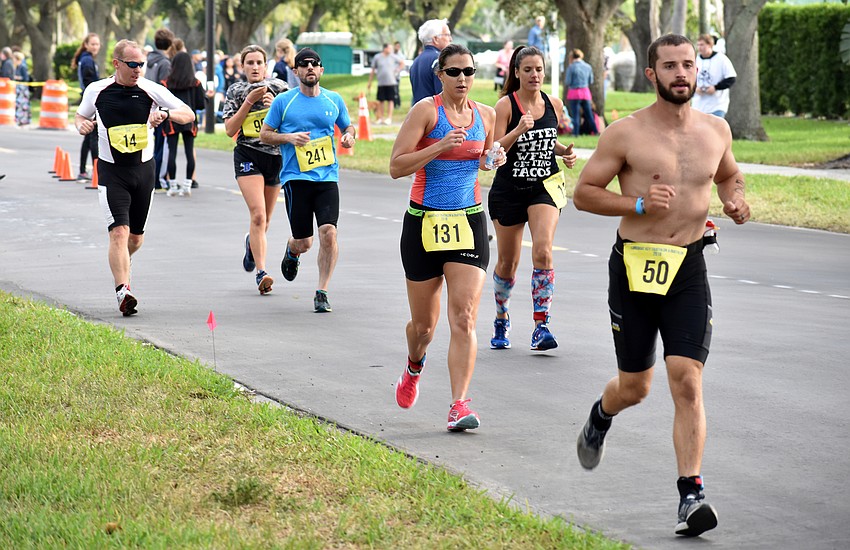 International triathlon participants ran five miles while sprint triathlon participants ran two-and-a-half miles.