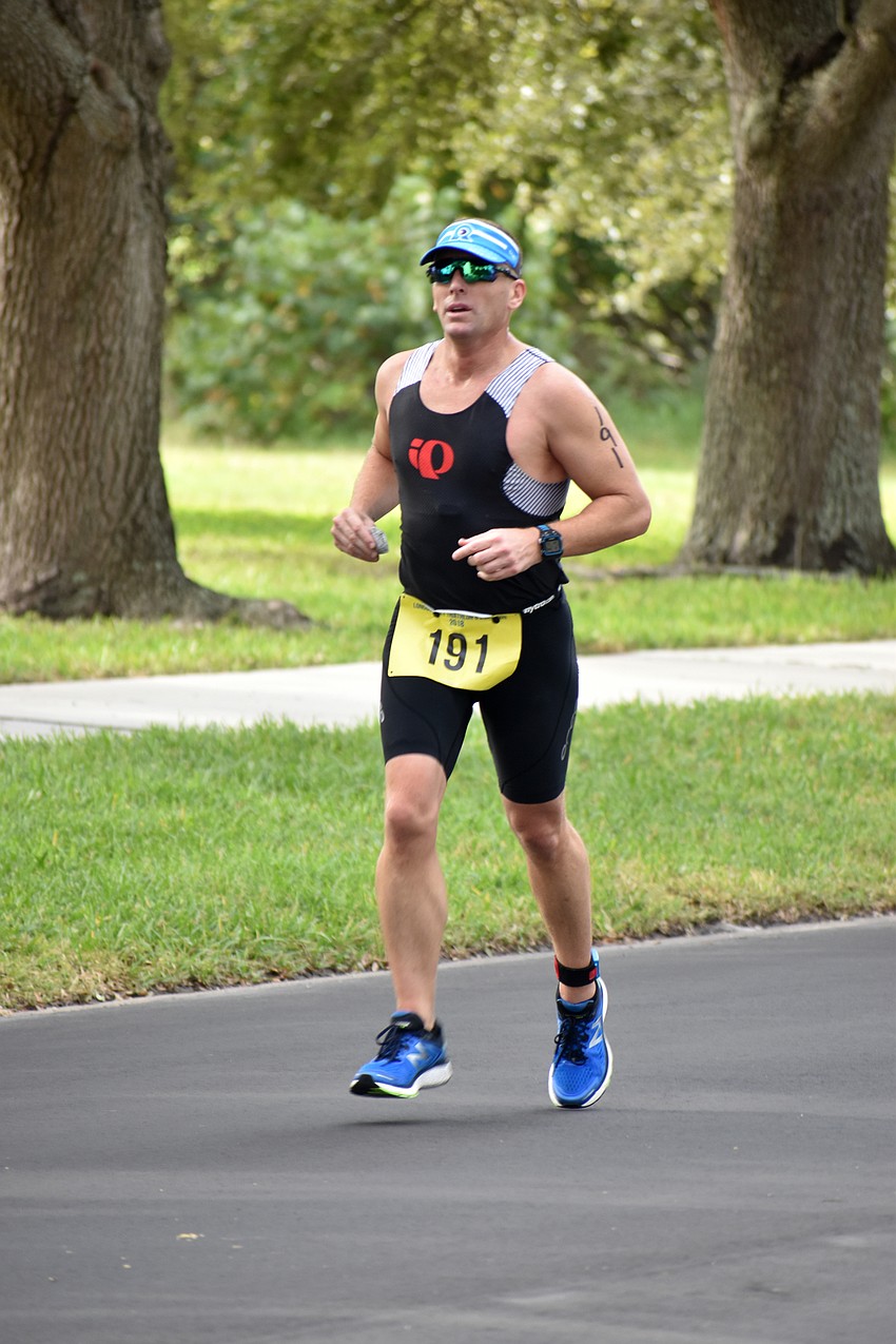 International triathlon participants ran five miles while sprint triathlon participants ran two-and-a-half miles.