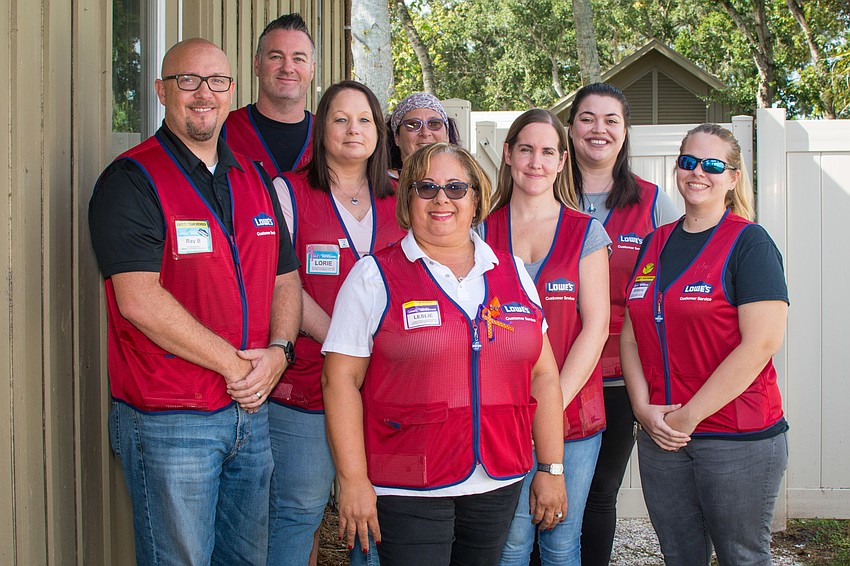 Team members from two local Lowe's stores volunteered their time and labor to renovate SPARCC's pet kennel.