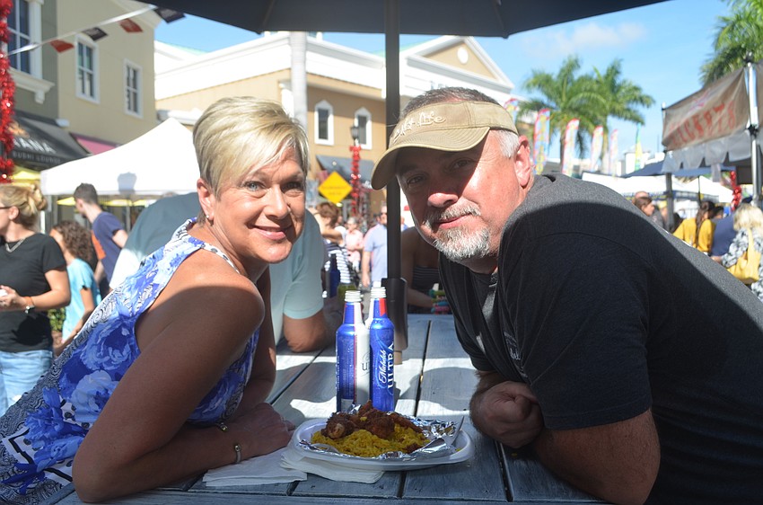 Lakewood Ranch's Laura Thompson and Lee Jarvis decided to try something different from seafood, trying out the caribbean jerk chicken instead.