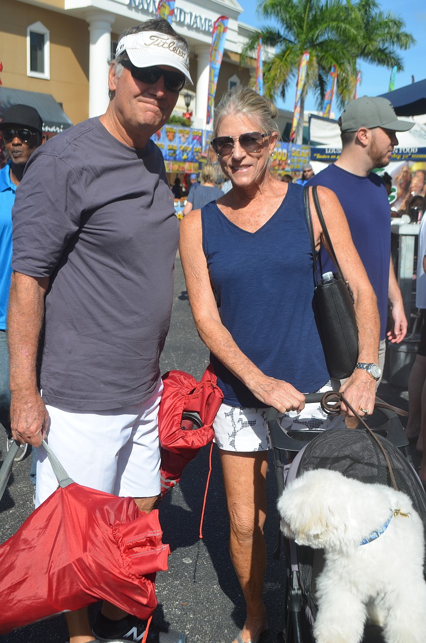 Lakewood Ranch's Steve and Lindy Foster are excited to dog watch with their own puppy named Bear at the festival.