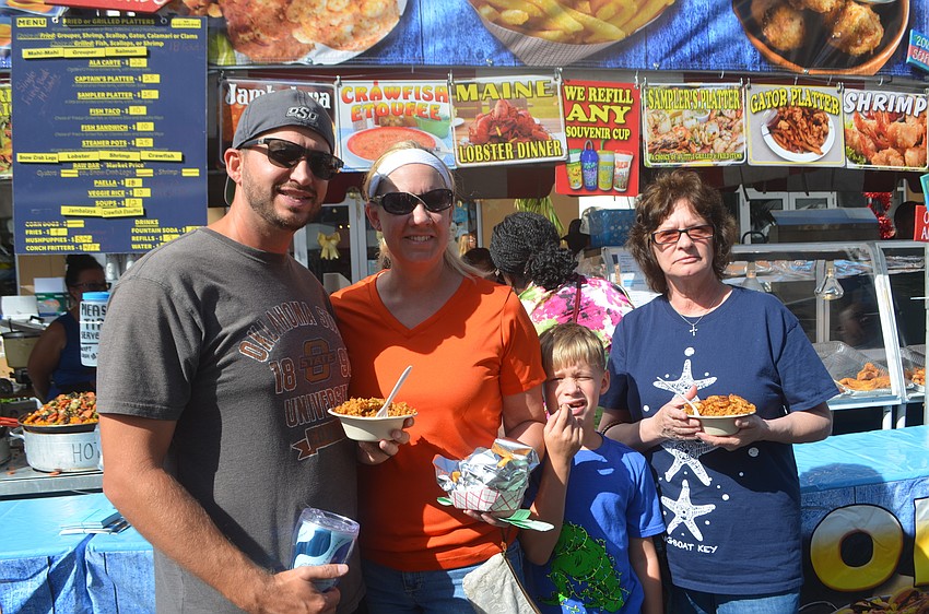Bradenton's Jack Reininger, Bethany Reininger, Jaxson Reininger, 8, and Sue Reininger say their food is very good, and they tried a little bit of everything.