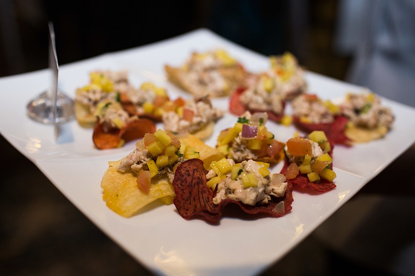 Appetizers, such as this jerk chicken salad, were passed around during social hour.