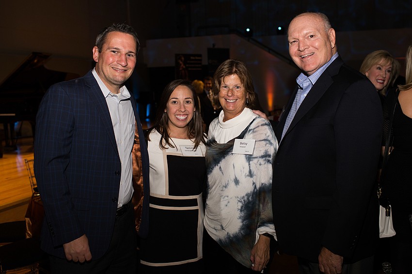 Greg Badger, Tammie Sandoval-Badger and Betsy and Ron Koepsel