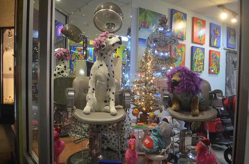 The window display at Wet Noses is a crowd favorite, capturing the silliness of the season.