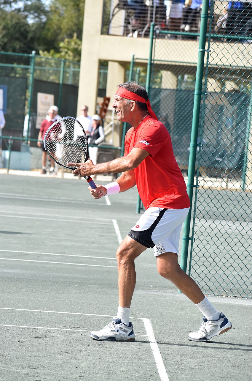 Steven Brady gets ready to return a ball.