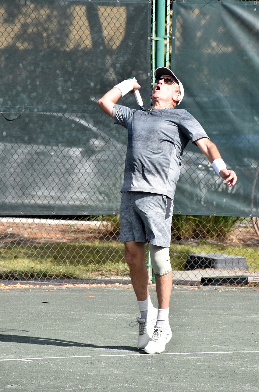 Boris Serebro serves the ball during a Friday match.