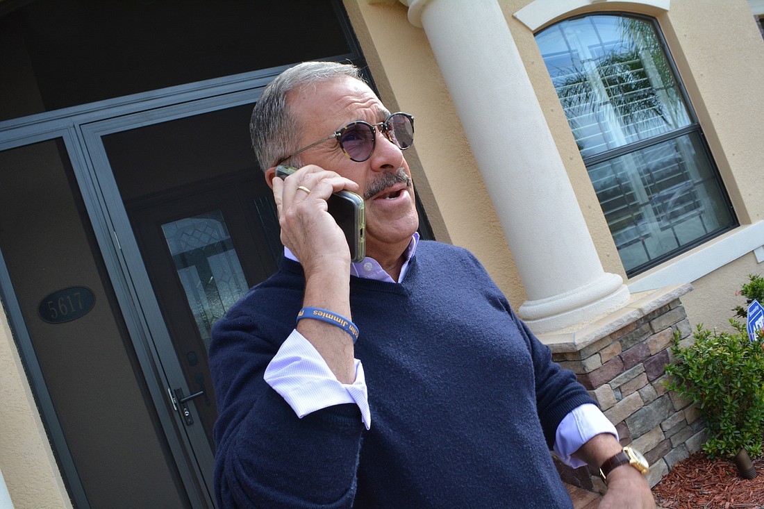 Lakewood Ranch resident Philip Cabibi had to buy a signal booster so his cell phone would work in his home. He said if coverage does not improve, he may have to move outside Lakewood Ranch because of problems with service.