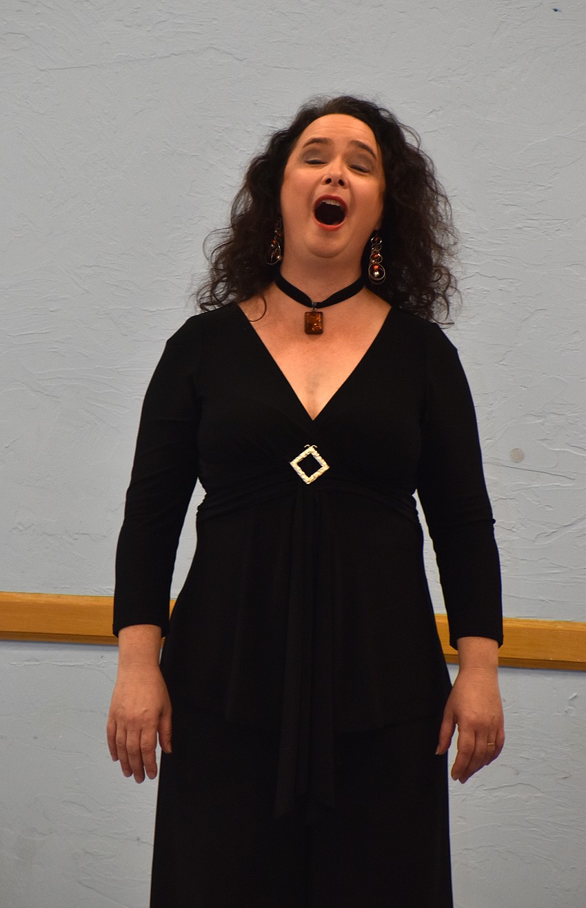 Michelle Giglio sings Christmas songs during an annual concert at St. Mary.