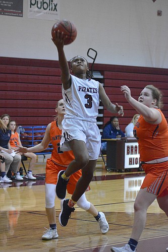 Pirates sophomore guard O&#39;Mariah Gordon gets in the lane for a layup against Bradenton Christian.