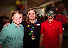 Ryan Blitz and Executive Director Rebecca Blitz with Varun Bulusu