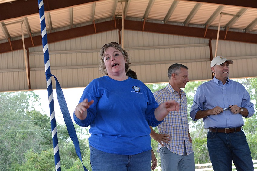 SMART Executive Director Brandi Ezell thanks guests, sponsors and volunteers for coming and for their support of the organization.