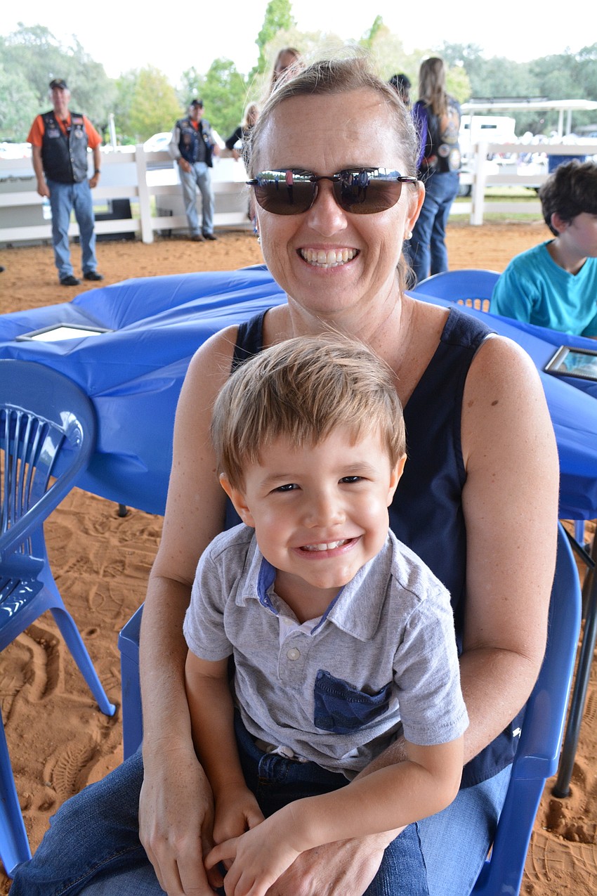Myakka 3-year-old Alex Lockhart enjoys a front row seat with his mom, Jenifer Schembri, who previously served on SMART's board of directors.