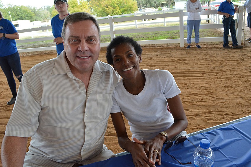 Summerfield resident John Annis and his wife Regina Morris attend the ceremony.