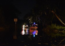 About six motor boats, decorated in Christmas lights, arrived at Linger Lodge shortly after 7 p.m. They left from Jiggs Landing and made their way down the Braden River.