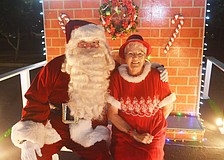 Santa and Mrs. Claus are always the last float on the parade.