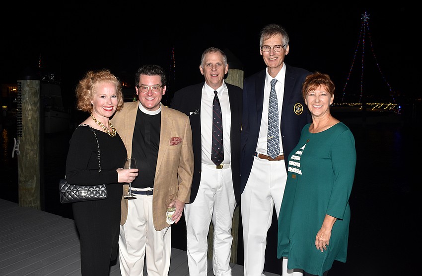 Malacy and the Rev. Charleston Wilson, Commodore Bob Williams, Fleet Captain Jon Turner and Susan Pinzino