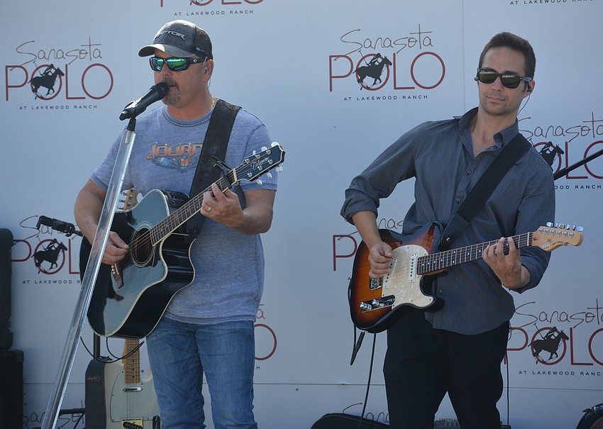 Cory Hildreth and Erol Ozsever of One Night Rodeo entertain the tailgaters.