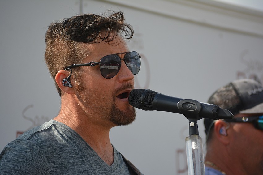 Duane Allison of One Night Rodeo belts out a country tune.