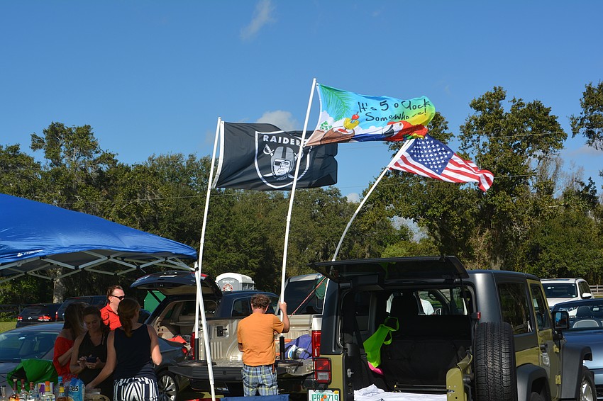 A steady wind stretched the flags straight out on opening day.