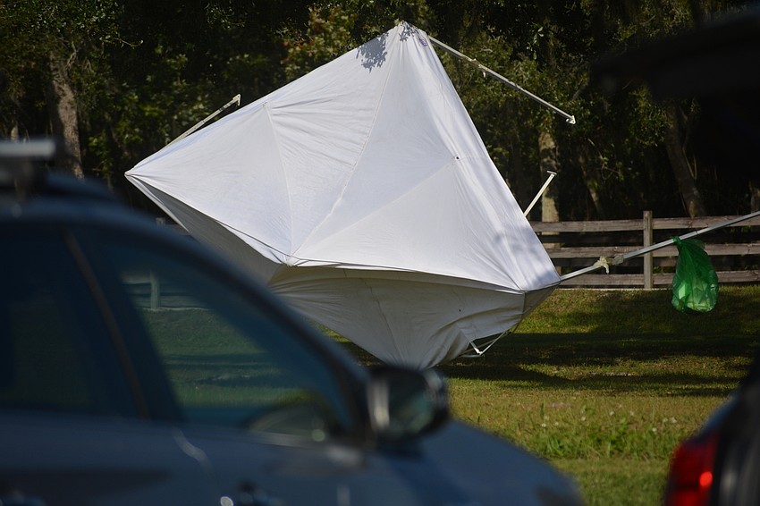 The wind turned one canopy into a projectile.
