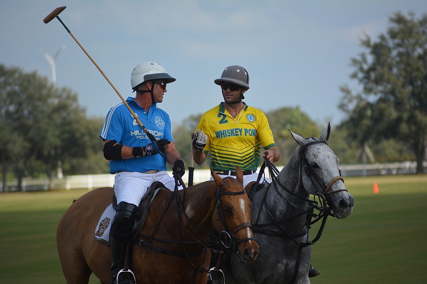 Hillcroft's James Miller and Whiskey Pond's Herndon Radcliff visit between chukkers.