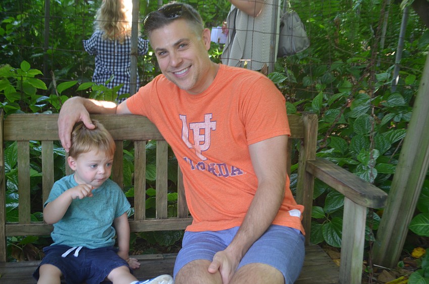 Oliver Tindal and Ben Tindal take a break from the hunt to eat their finds.