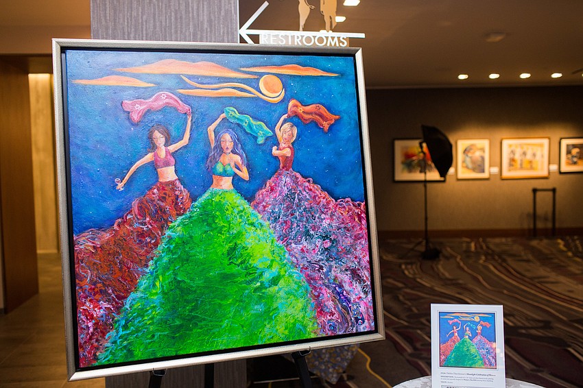 Debbie Dannheiser donated a painting celebrating women to be auctioned off.