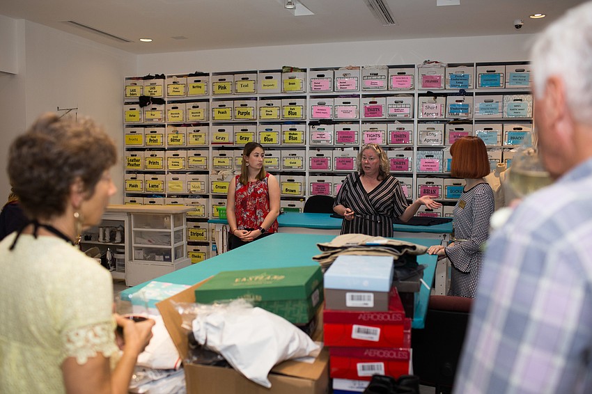 Costume Shop Manager Adrienne Webber answers questions from those touring the shop.