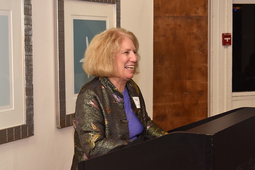 Volunteer Coordinator Dale Wolfson laughs as she’s introduced.