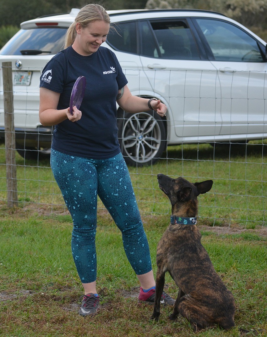 Allie Menendez owns the Foster Dog Farms which hosts the competition. She competes with her dog, Siren.
