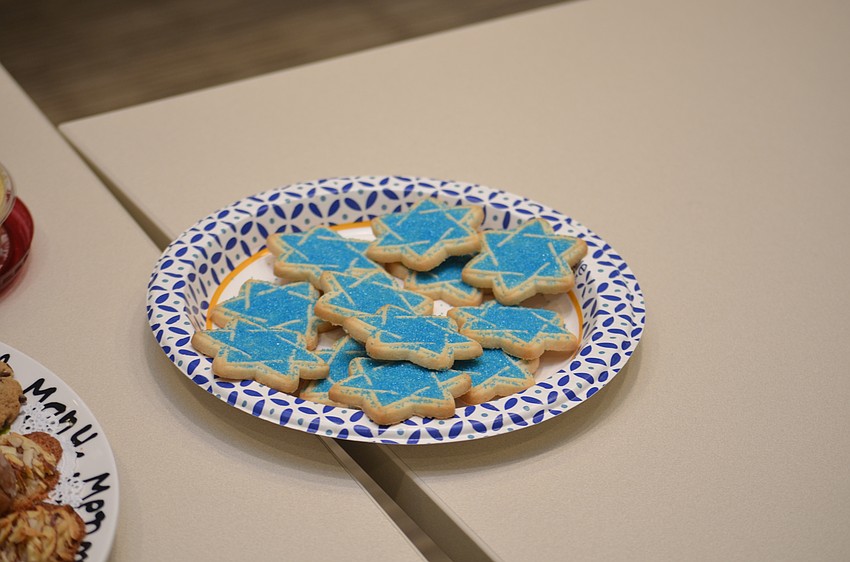Attendees made sugar cookies in the shape of the Star of David.