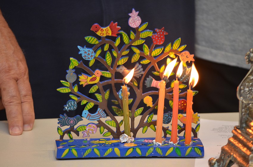This menorah depicts the tree of life.