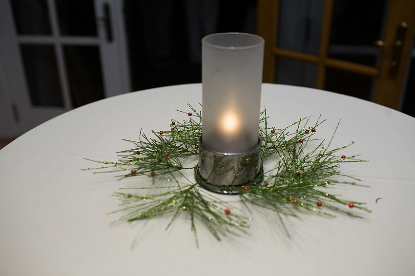 The centerpieces for the cocktail tables were festive for the holiday season.